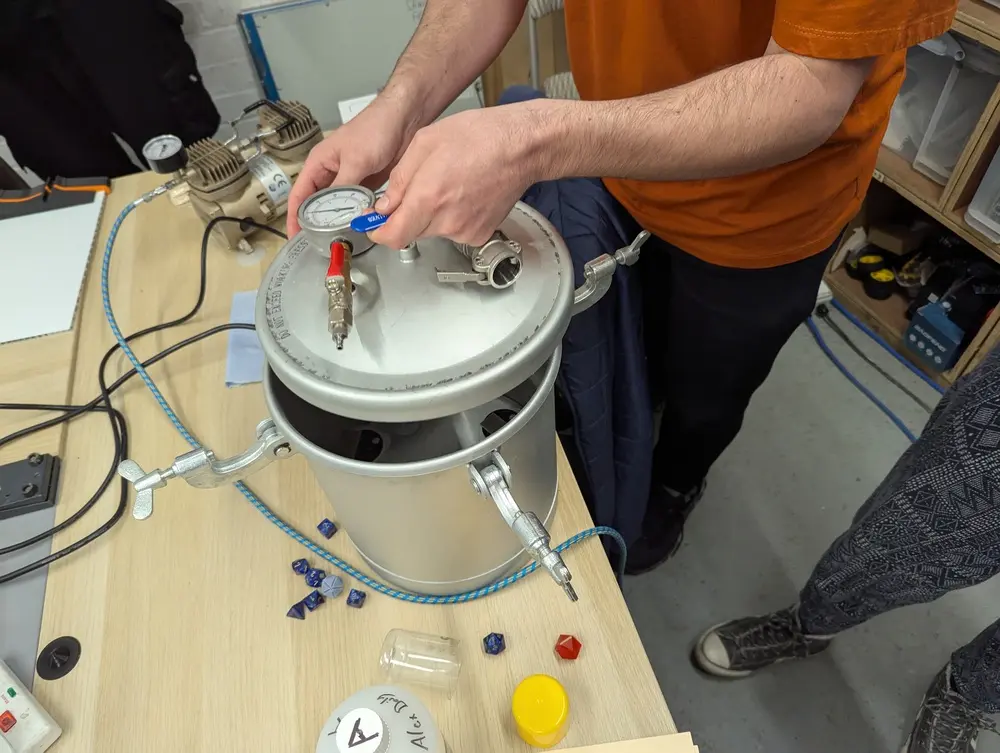 picture of person putting lid on pressure pot