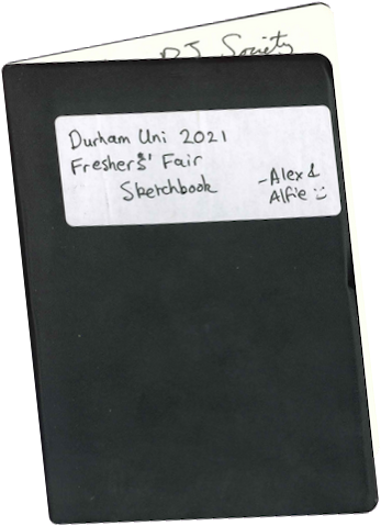 Photo of sketchbook front cover, slightly open. Title reads 'Durham Uni: 2021 Freshers' Fair Sketchbook